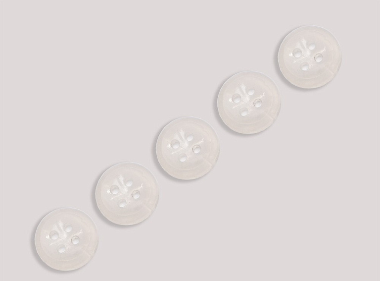 Фото ткани Пуговица круглая (пластик), цвет - молочный