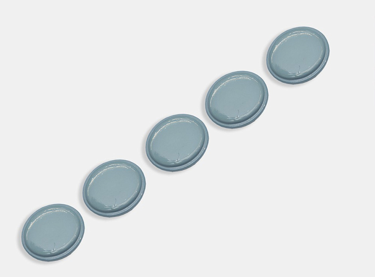 Фото ткани Пуговица овальная, цвет - бирюзовый