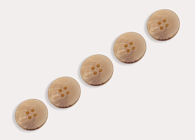 Фото ткани Пуговица круглая пластиковая, цвет - бежевый