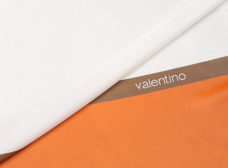 Фото ткани Подкладочная ткань тип Valentino с рисунком (купон), цвет - белый и оранжевый