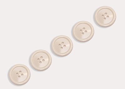 Фото ткани Пуговица круглая (пластик), цвет - молочный